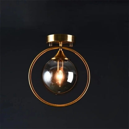Plafonnier Design Anneau Doré & Boule Verre