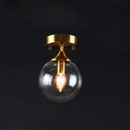Plafonnier Design Anneau Doré & Boule Verre