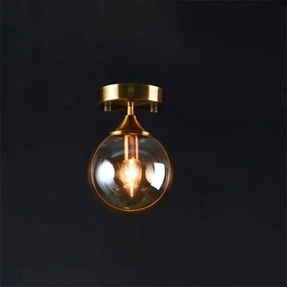 Plafonnier Design Anneau Doré & Boule Verre