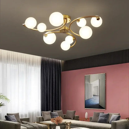 Plafonnier Doré Design Bras Courbés Globes Opalins